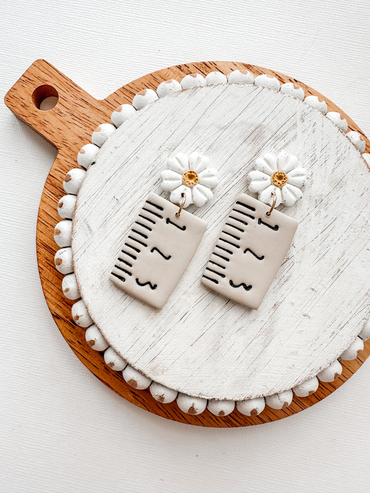 tan ruler dangles
