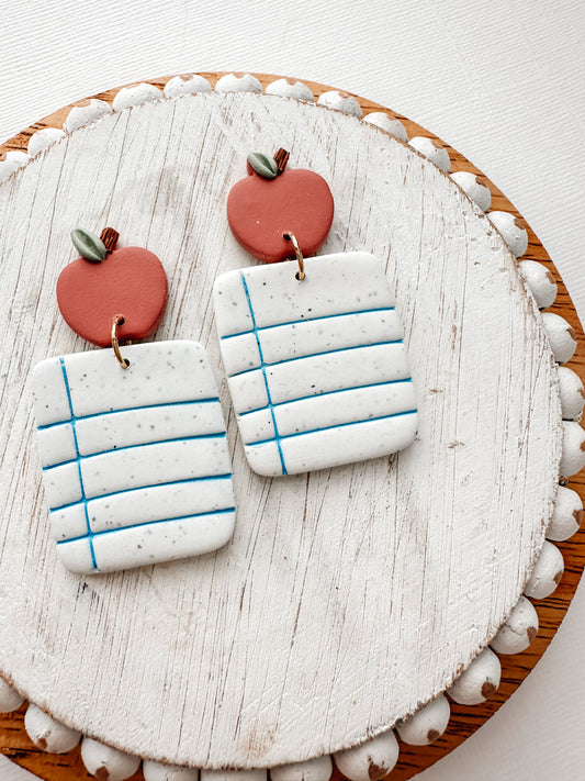 notebook paper & Apple dangles