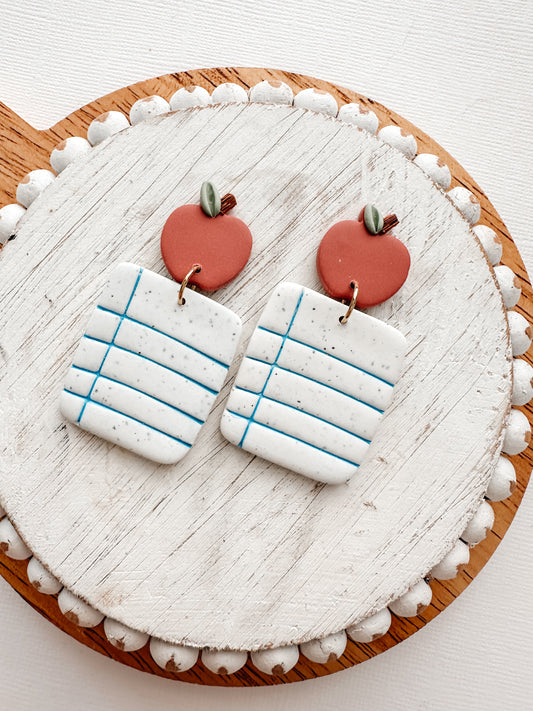 notebook paper & Apple dangles