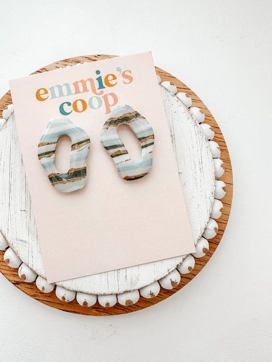 green and blue studs